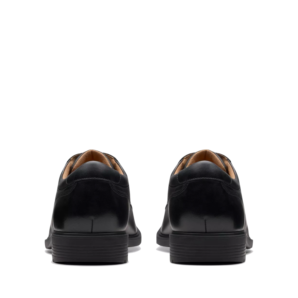 Back view of Clarks Eldredge Plain Leather Slip Resistant Lace Shoe for men.