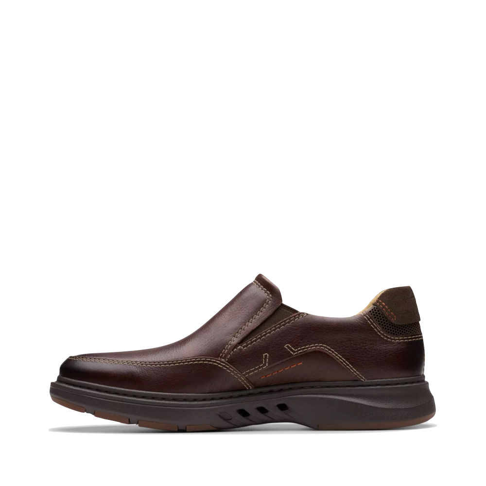Side (left) view of Clarks Un Briley Step Leather Slip On Shoe for men.