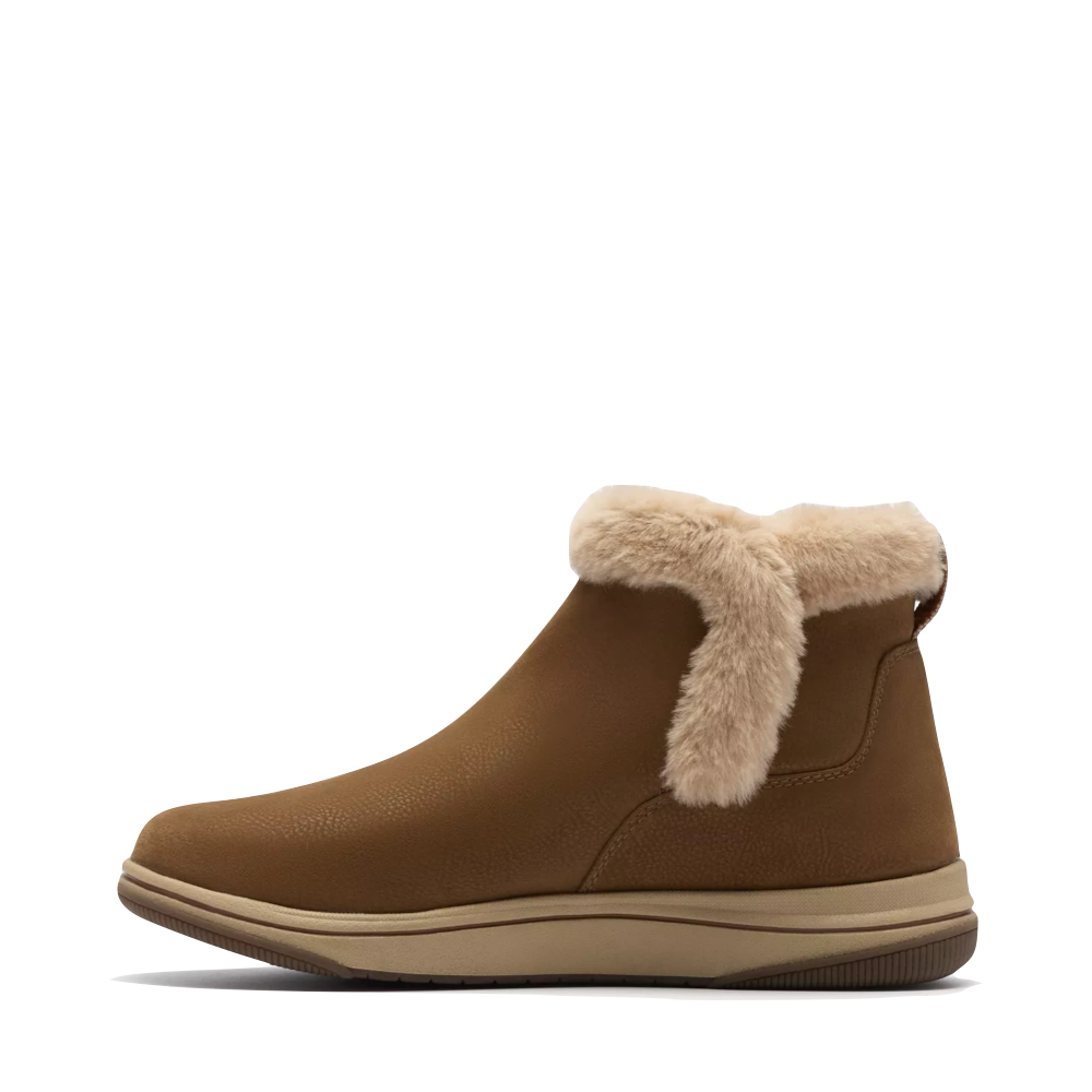 Side (left) view of Clarks Breeze Fur Boot for women.