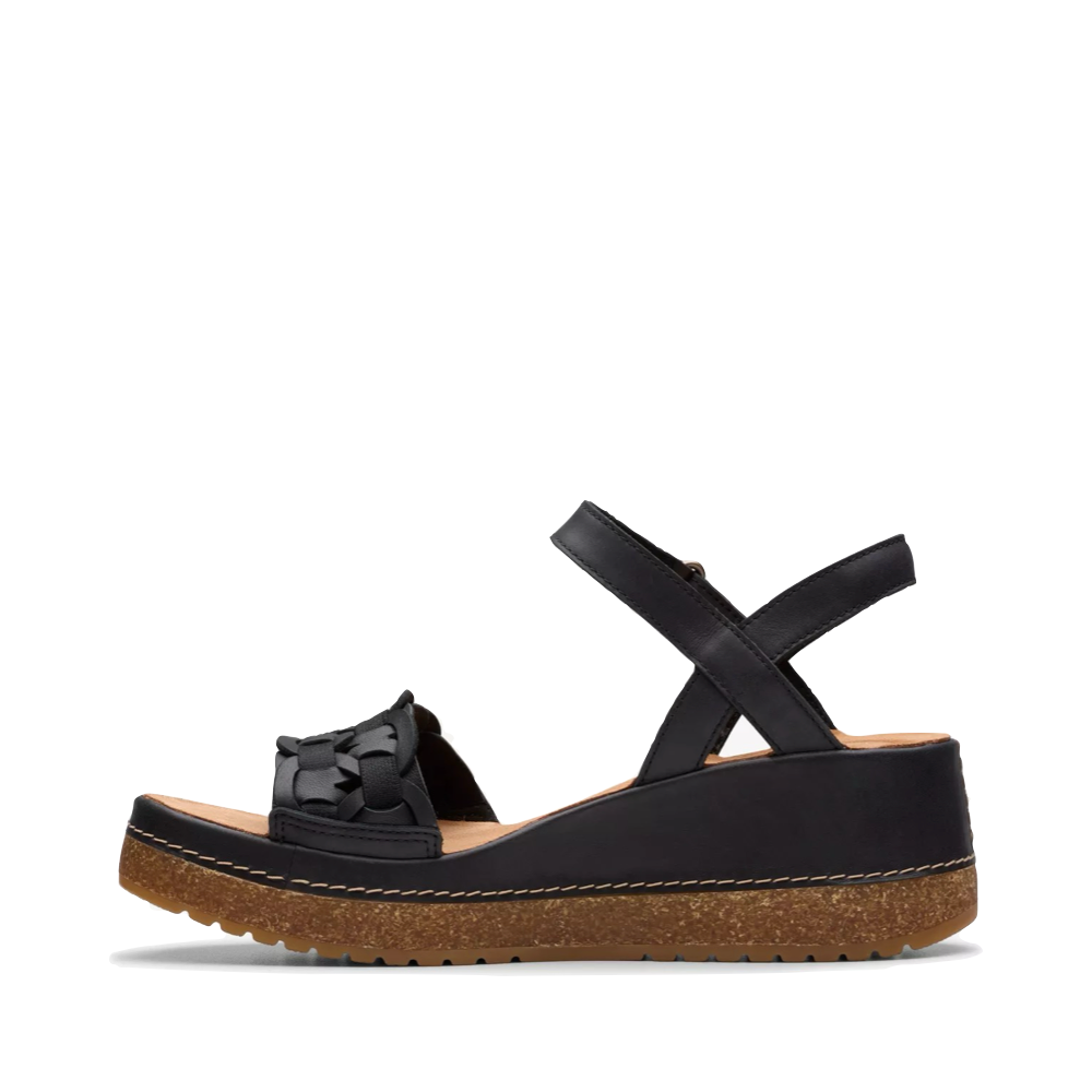 Side (left) view of Clarks Kassandra Bar Wedge Sandal for women.