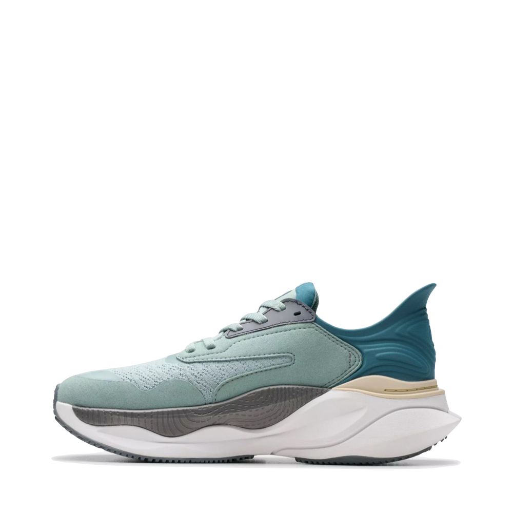 Side (left) view of Clarks Pace Sneaker for women.