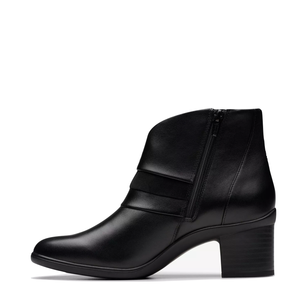 Side (left) view of Clarks Shaya Sky Heeled Ankle Boot for women.