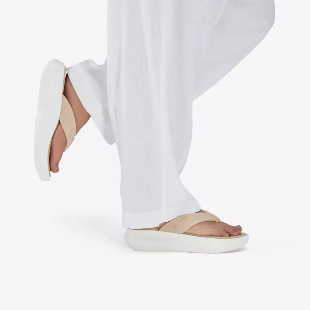 Model view of Clarks Solevana Post Flip Sandal for women.