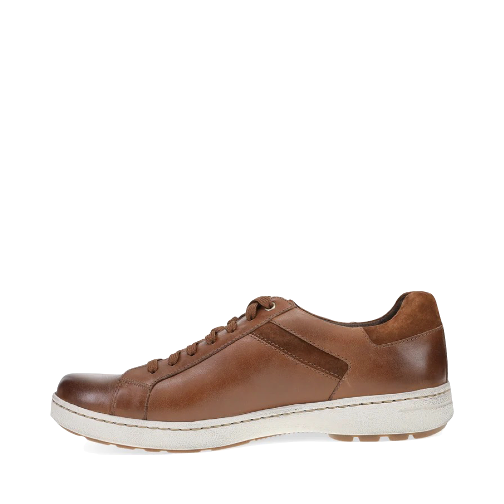 Side (left) view of Dansko Trevor Leather Tie Sneaker for men.