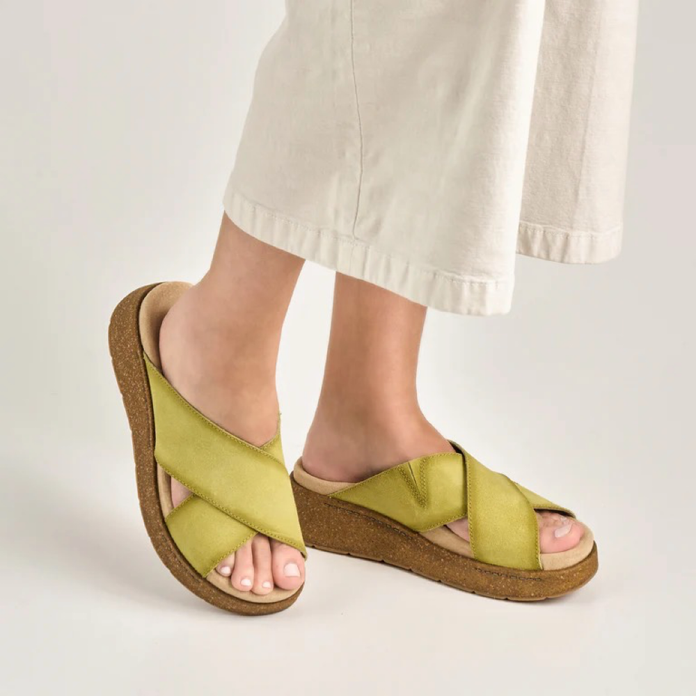 Model view of Dansko Bridget Leather Platform Slide Sandal for women.