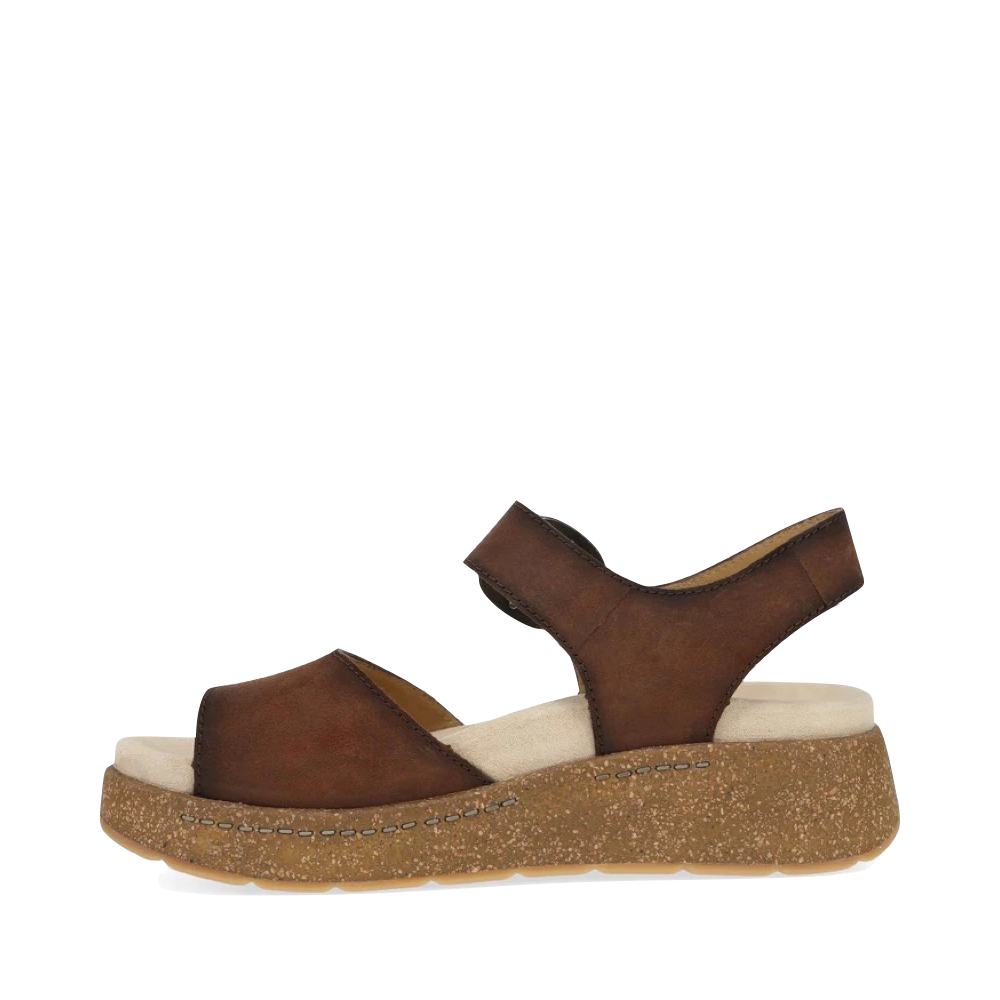 Side (left) view of Dansko Dianca Leather Platform Sandal for women.
