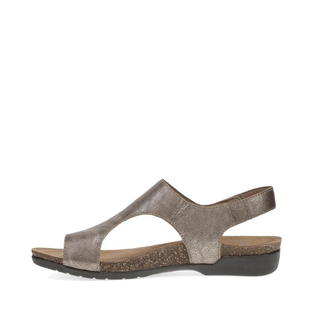 Side (left) view of Dansko Reece Thong Sandal for women.