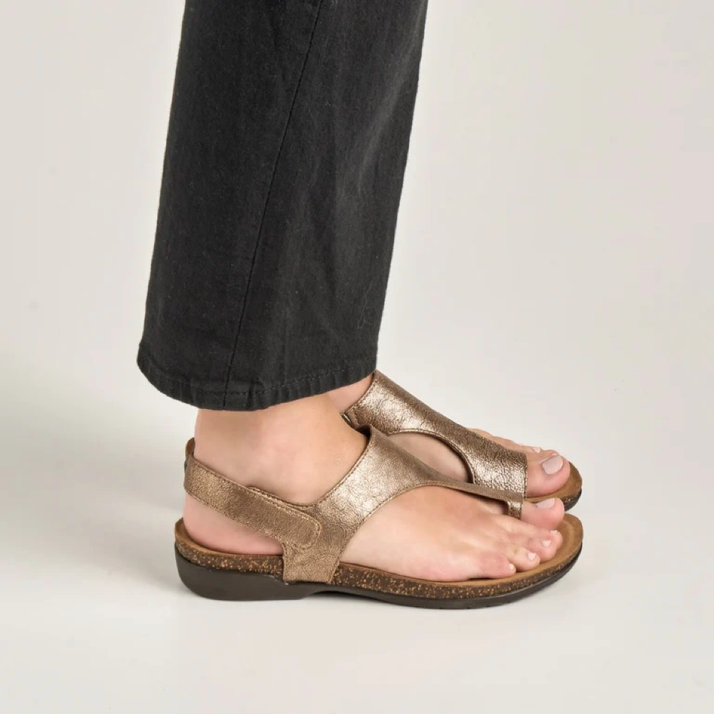 Model view of Dansko Reece Thong Sandal for women.