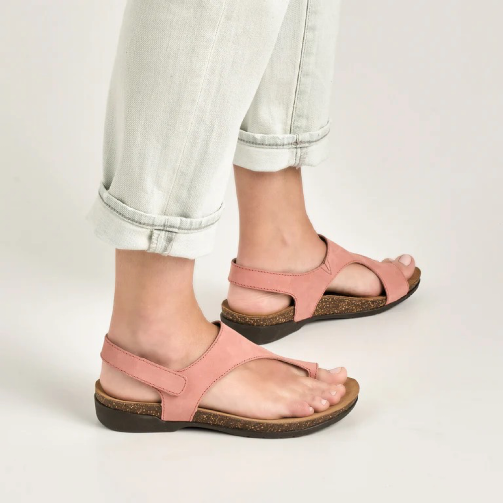 Model view of Dansko Reece Thong Sandal for women.