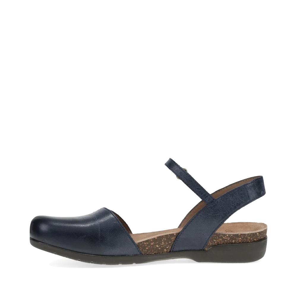 Side (left) view of Dansko Rowan Closed Toe Sandal for women.