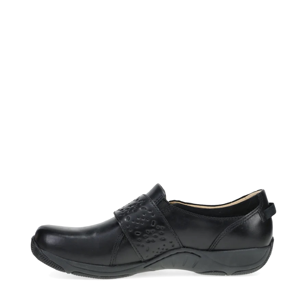 Side (left) view of Dansko Sallie Adjustable Strap Shoe for women.