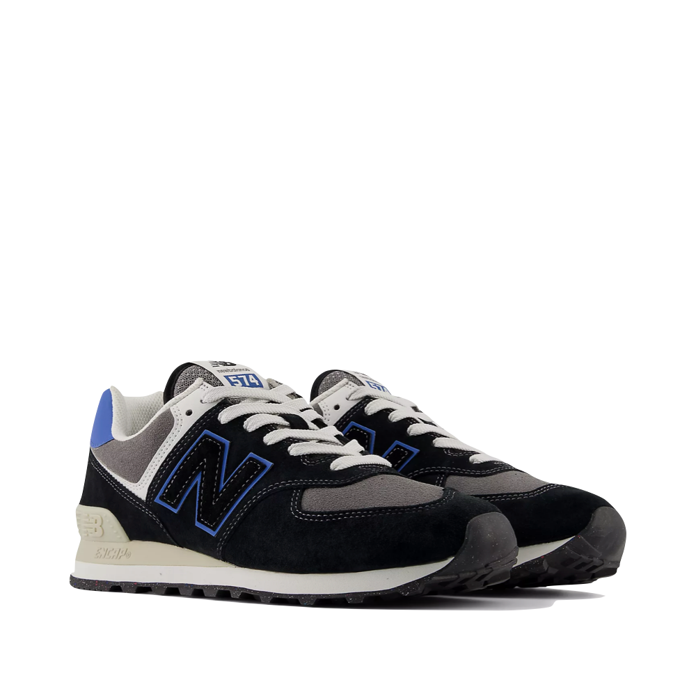 Mudguard and Toe view of New Balance 574 Sneaker for men.