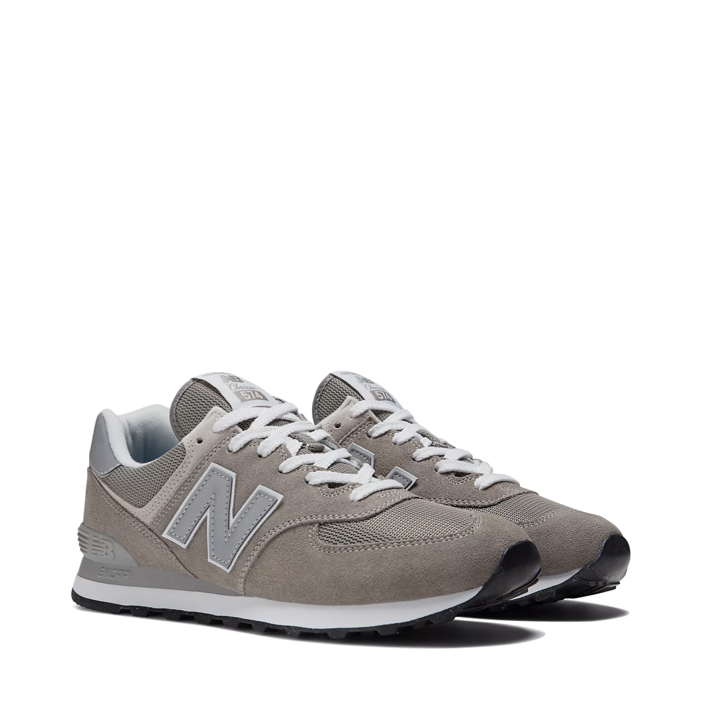 Mudguard and Toe view of New Balance 574 Sneaker for men.
