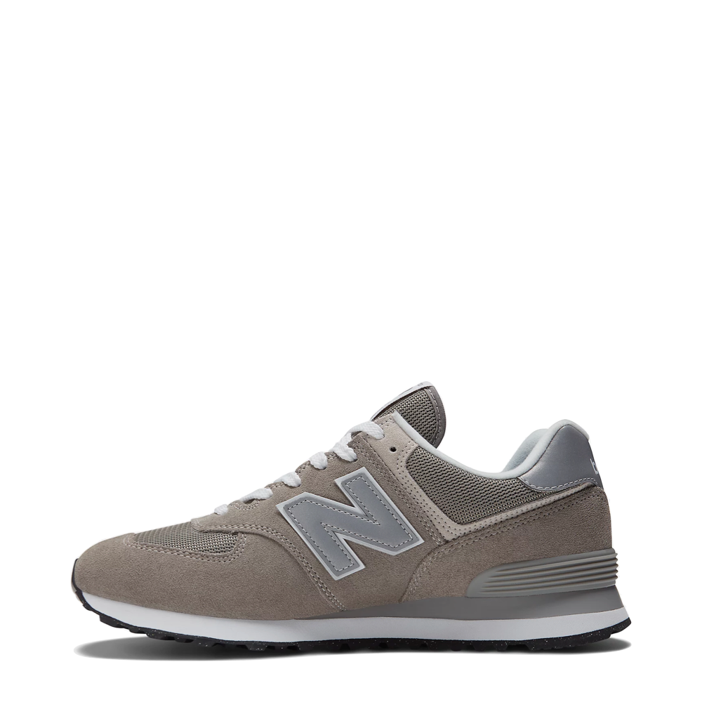 Side (left) view of New Balance 574 Sneaker for men.