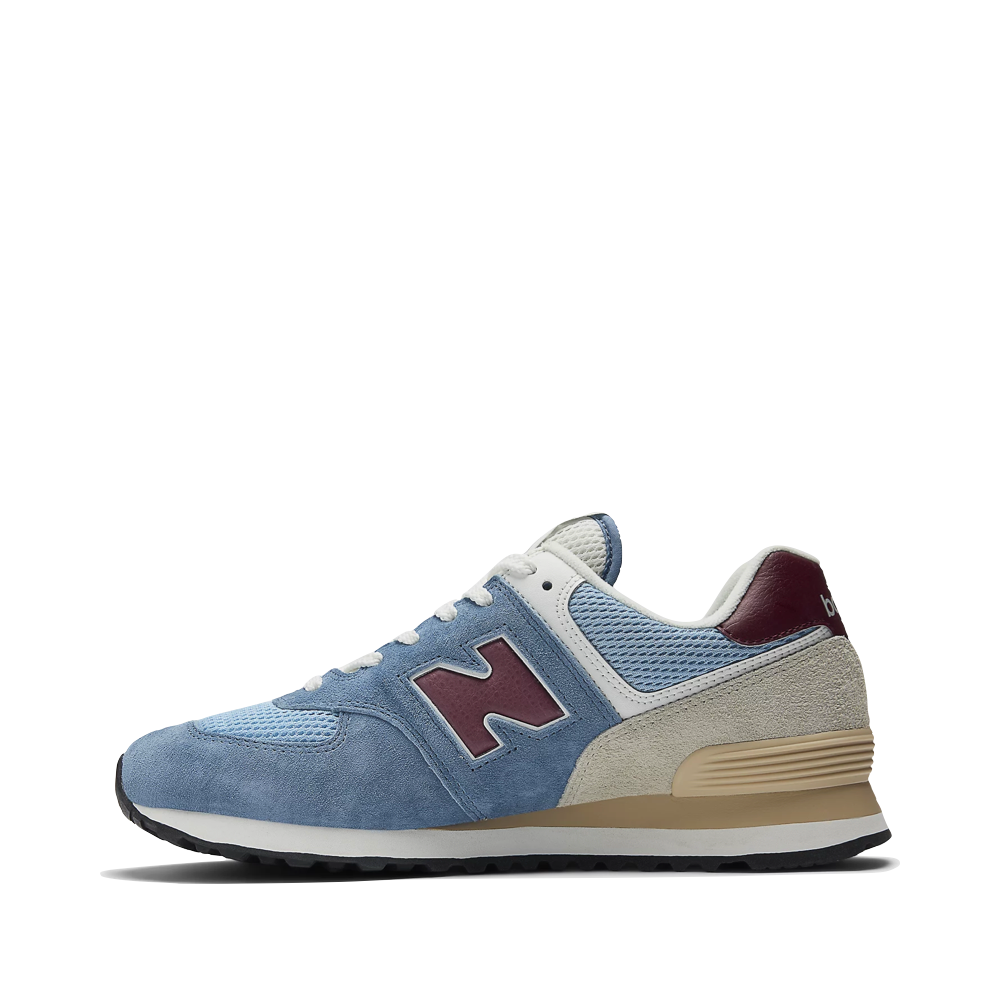 Side (left) view of New Balance 574 Sneaker for women.