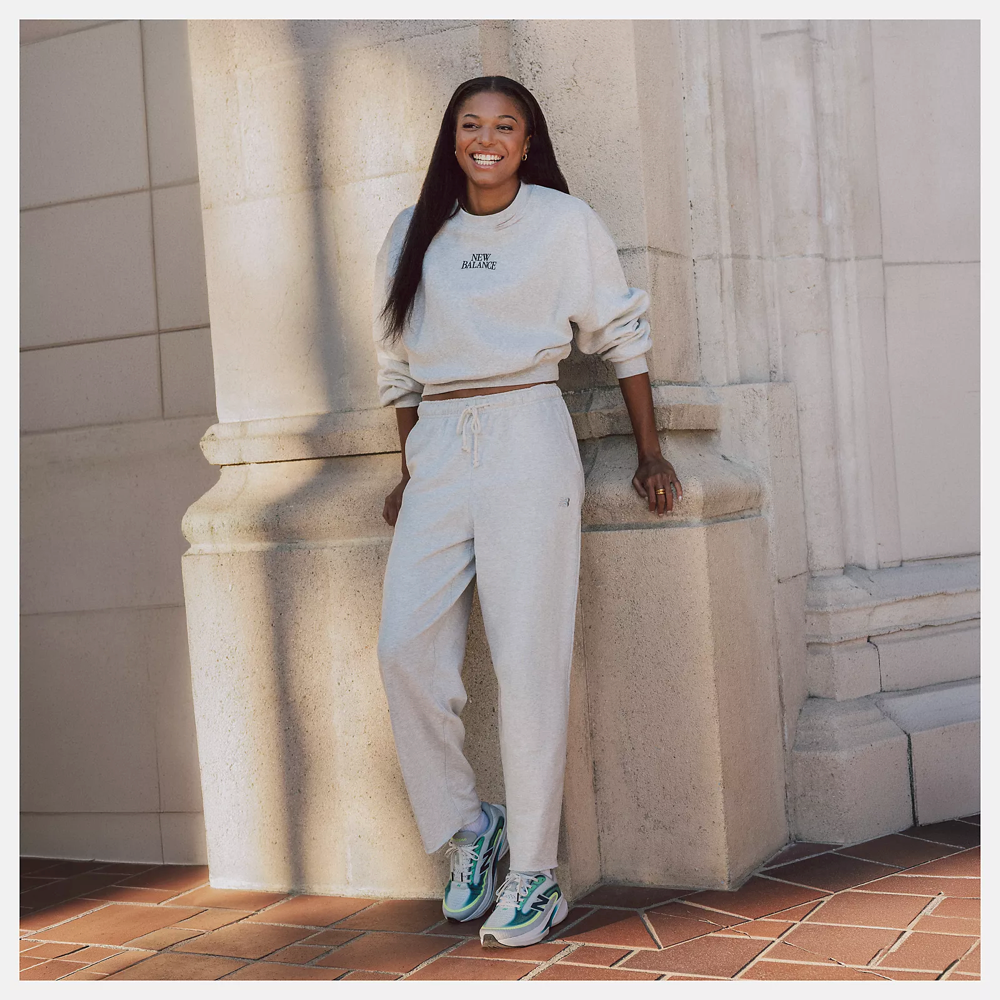 Model view of New Balance Ellipse V1 Sneaker for women.