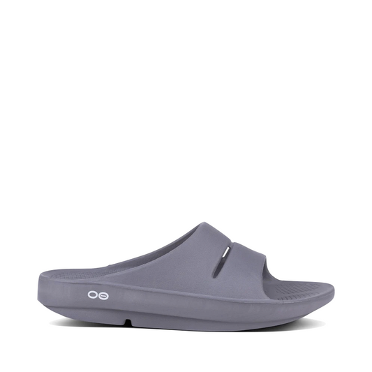 Side (right) view of OOfos OOahh Slide Sandal.