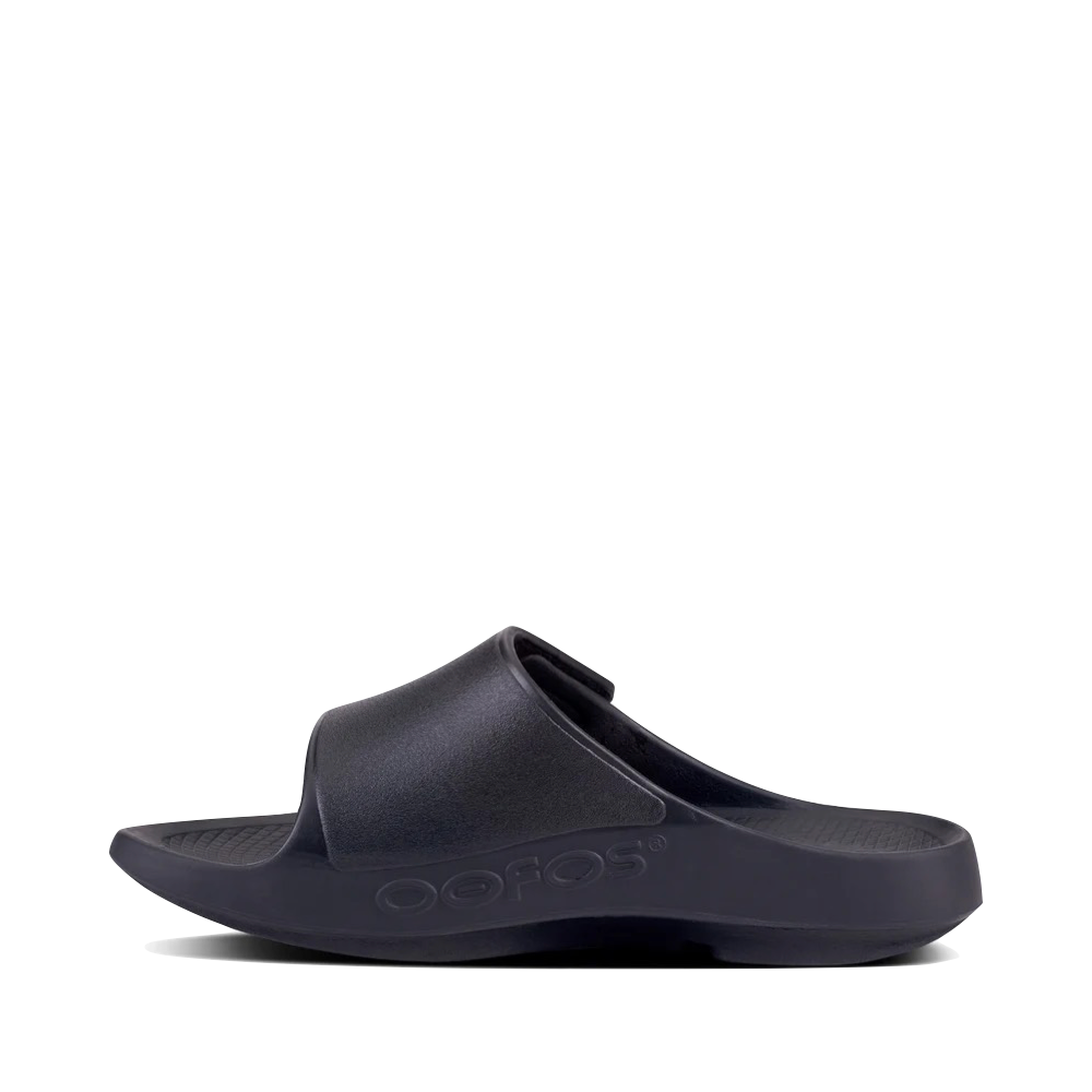 Side (left) view of OOfos OOahh Sport Flex Adjustable Slide Sandal.