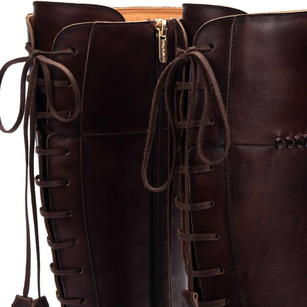 Detail view of Pikolinos Medina Tall Leather Heeled Back Lace Boot for women.