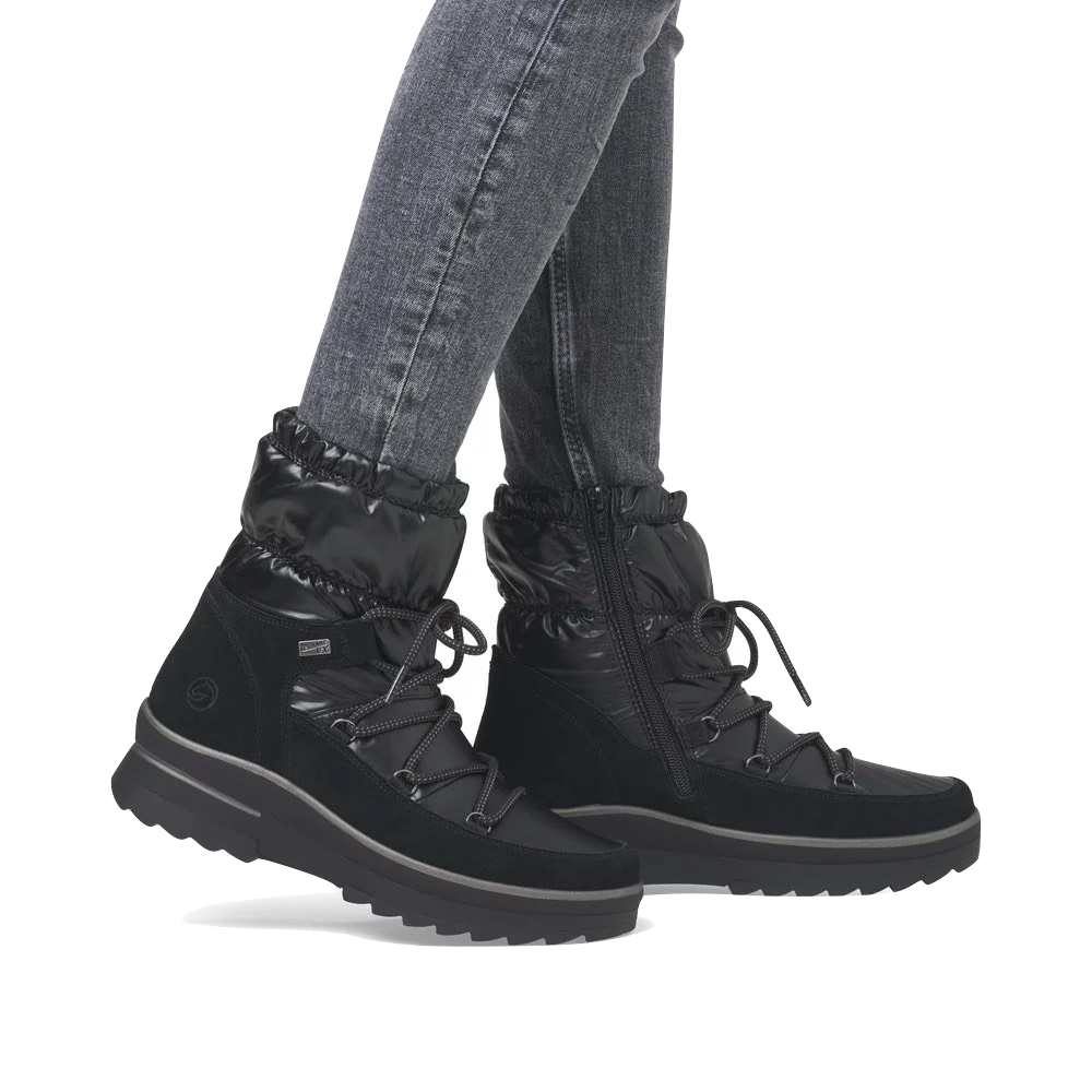 Model view of Remonte Lelisha 70 Puffer Waterproof Boot for women.