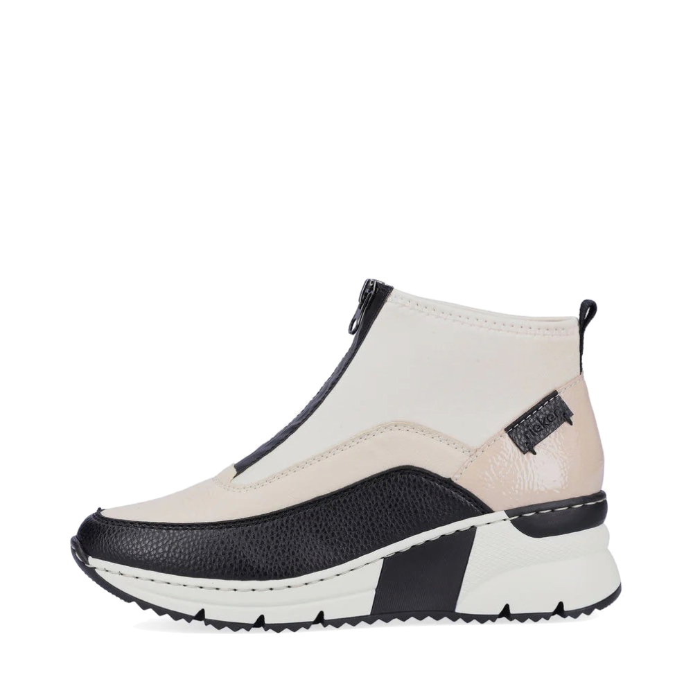 Side (left) view of Rieker Kitty 52 Front Zip Wedge Boot for women.
