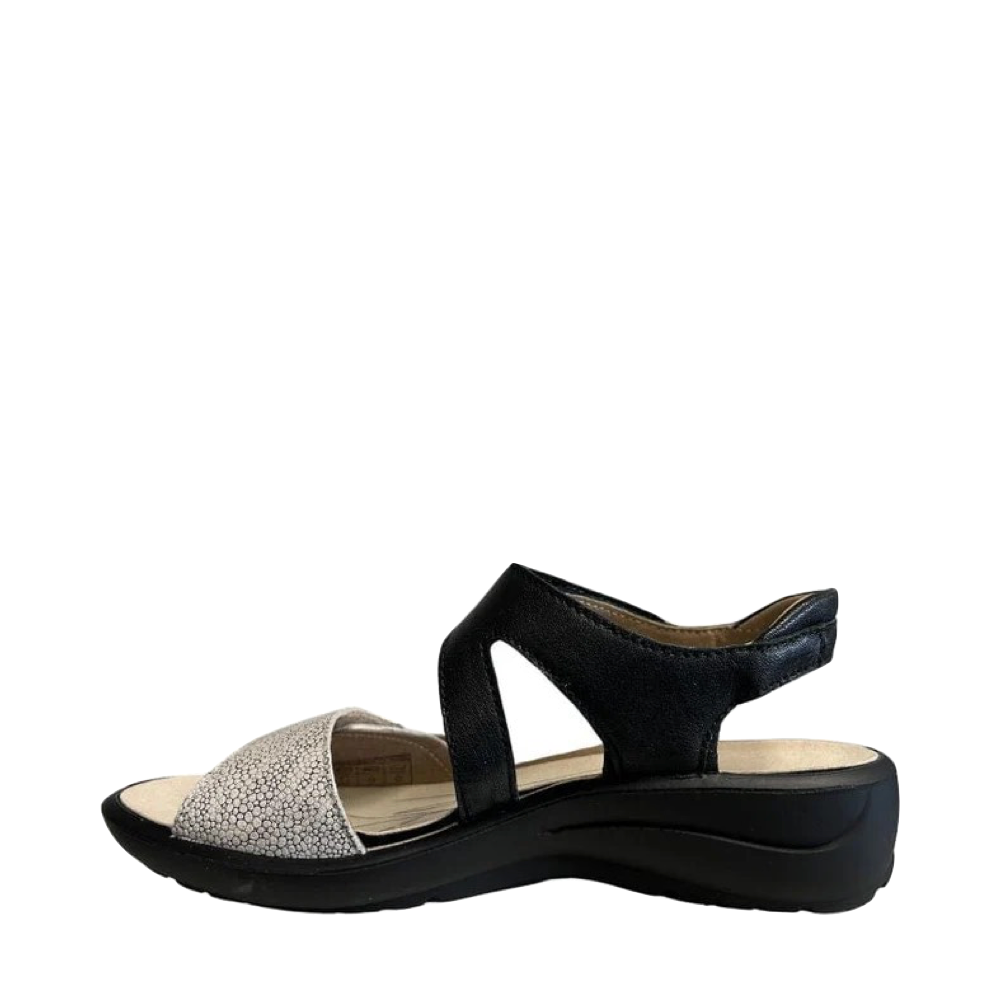 Side (left) view of Romika Annecy 01 Sandal for women.