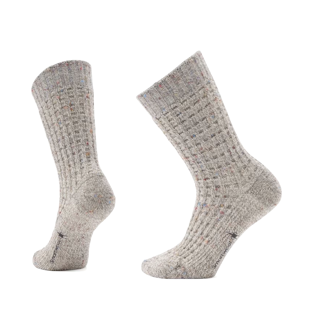 Side (left) and bottom view of Smartwool Everyday Cozy Waffle Press Crew Socks for women.