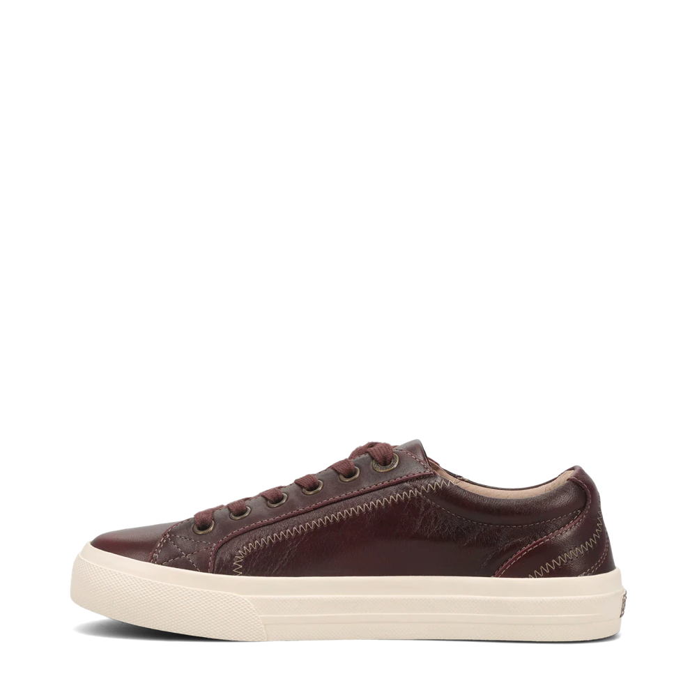 Side (left) view of Taos Plum Soul Lux Leather Sneaker for women.