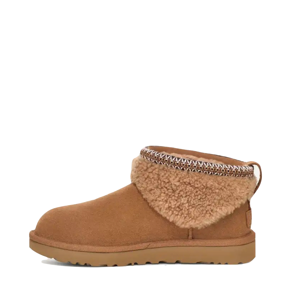 Side (left) view of Ugg Classic Ultra Mini Maxi Curly Boot for women.