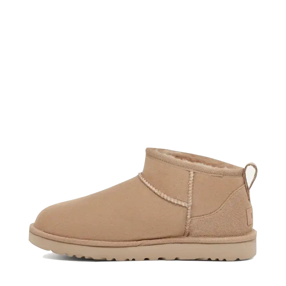 Side (left) view of Ugg Classic Ultra Mini Sheepskin Boot for women.