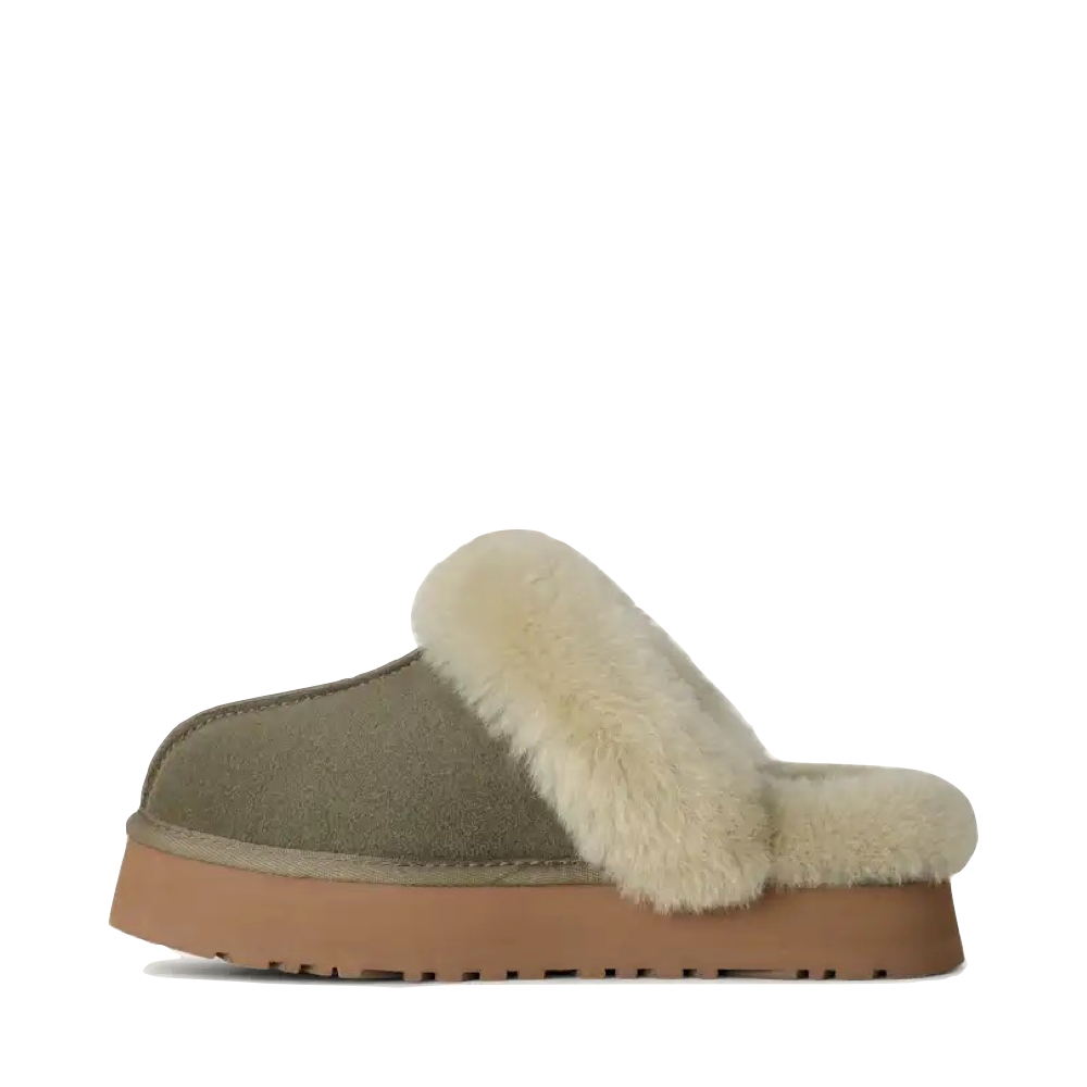 Side (left) view of Ugg Disquette Sheepskin slipper for women.