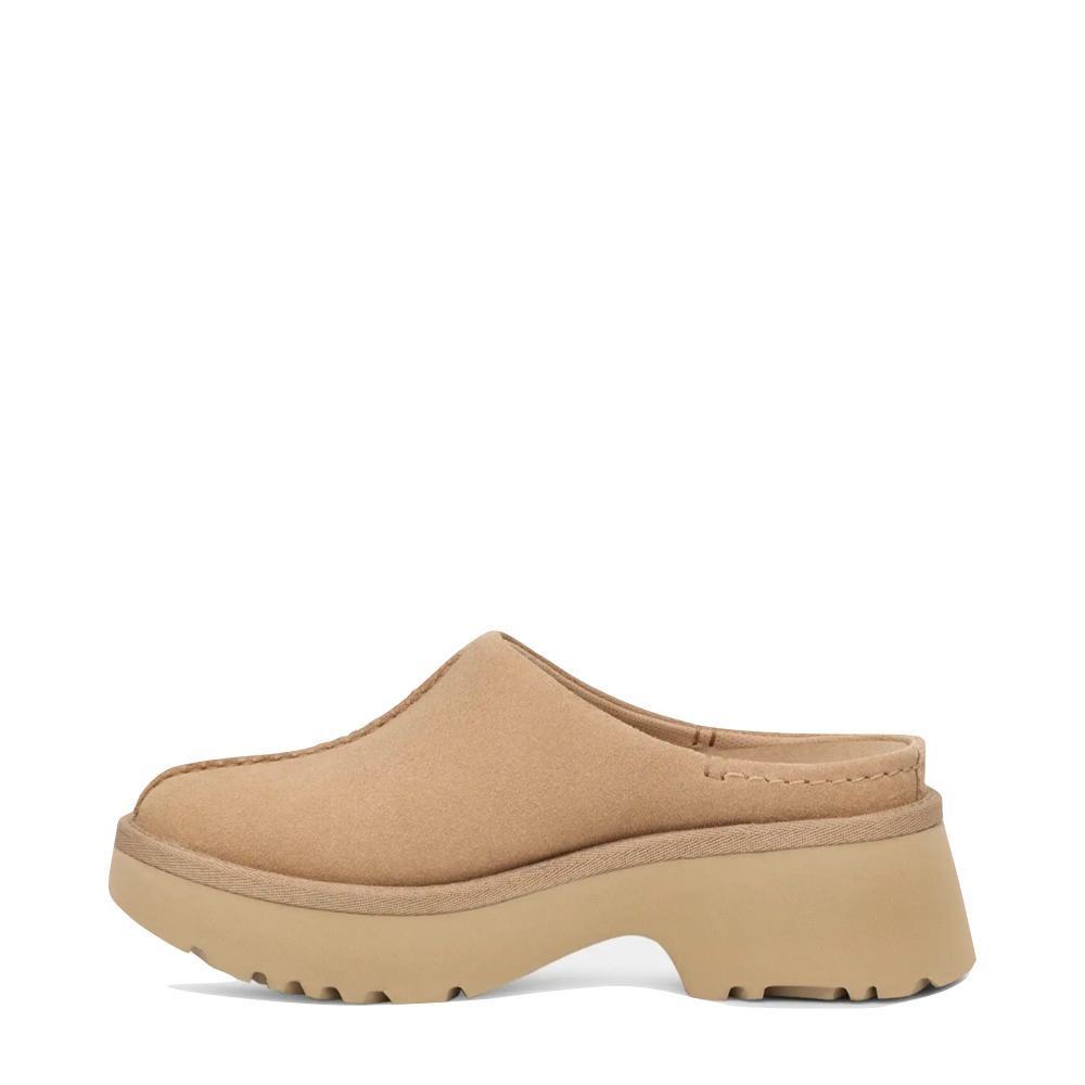 Side (left) view of Ugg New Heights Heeled Clog for women.