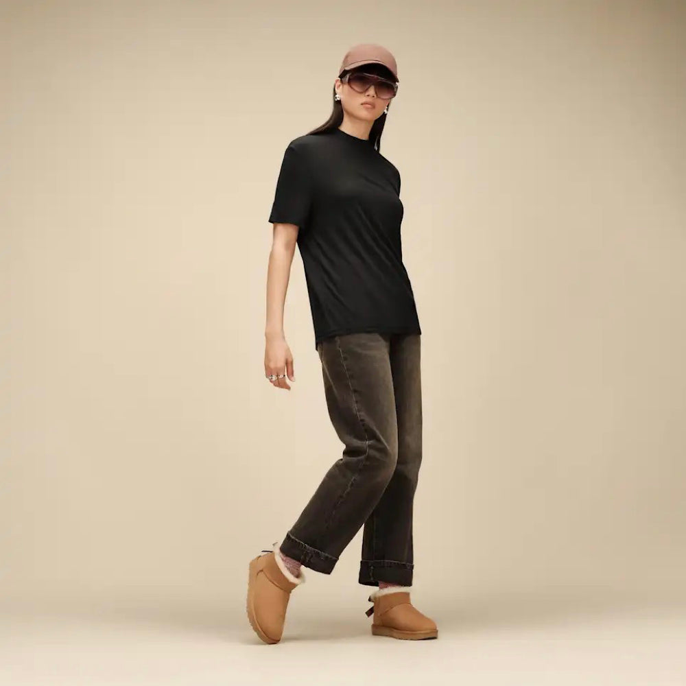 Model view of Ugg Ultra Mini Bailey Bow Boot for women.