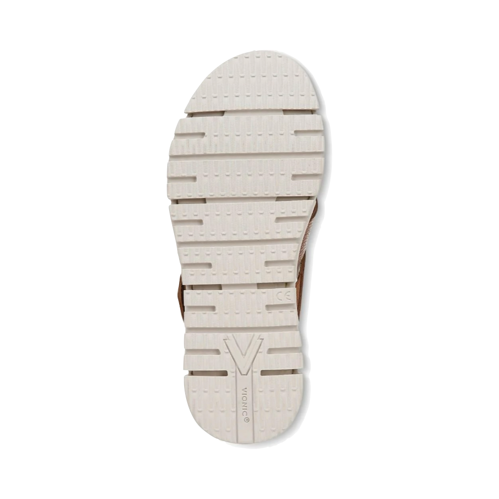 Bottom view of Vionic Uptown Sunset Leather Slide Wedge Sandal for women.