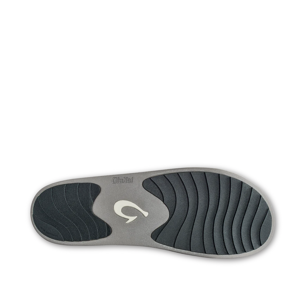 Bottom view of OluKai Ku iShearling Lined Slip On Clog Slipper for women.
