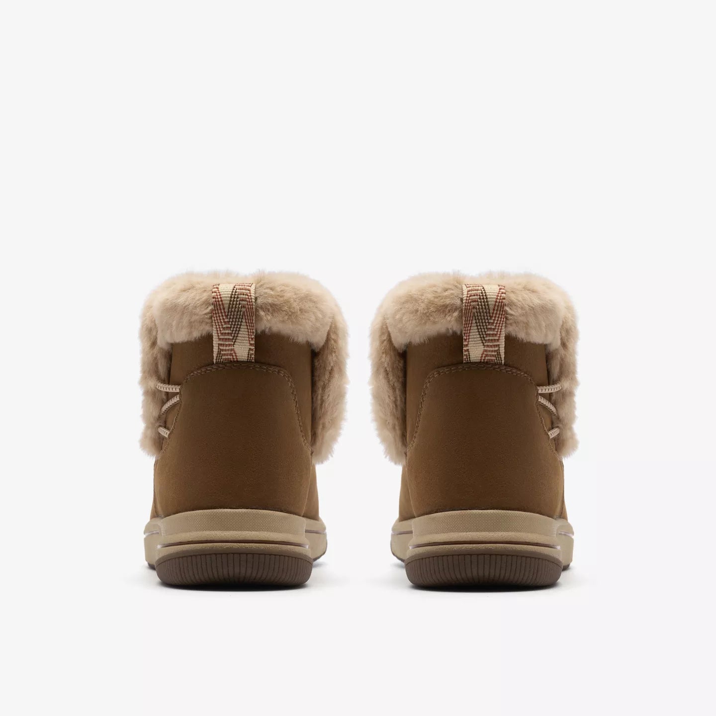 Clarks Women's Breeze Fur Boot in Dark Tan Combination
