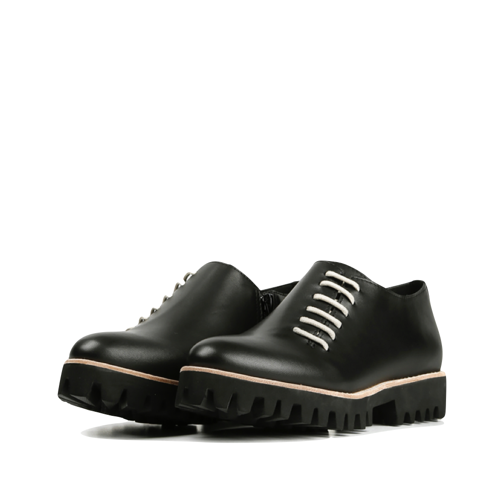 Reverse Mudguard and Toe view of ALL BLACK Footwear Side Cord Inside Zip Shoes for women.