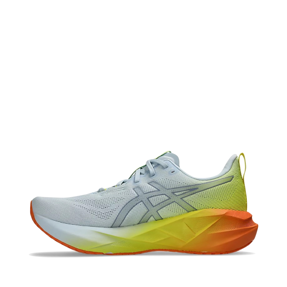 Side (left) view of Asics Novablast 5 Sunny Sizzle Sneaker for men.