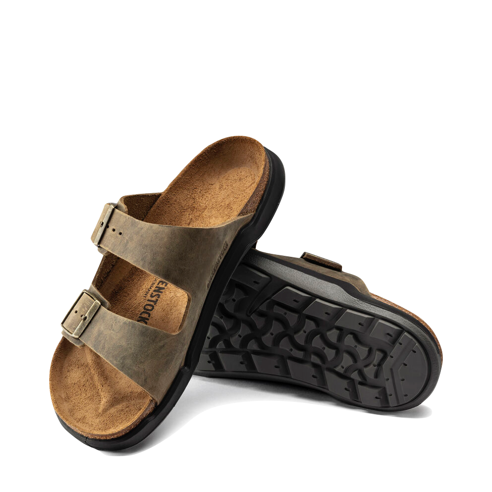 Side and bottom view of Birkenstock Arizona Rugged Leather Slide Sandal for men.