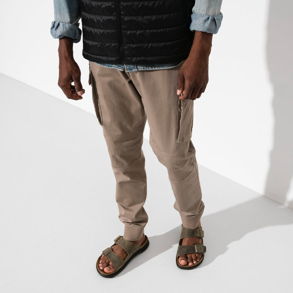 Model view of Birkenstock Arizona Rugged Leather Slide Sandal for men.