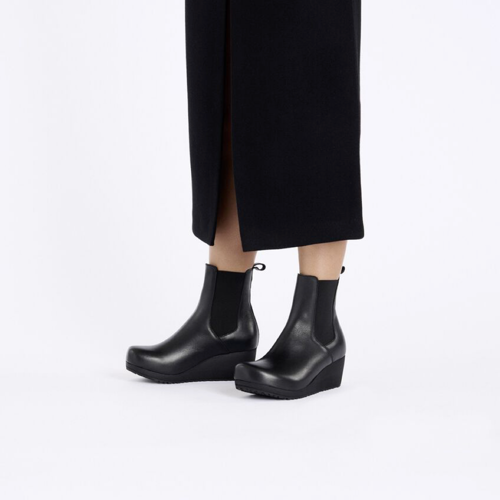 Model view of Birkenstock Ebba Leather Slip On Wedge Boot for women.
