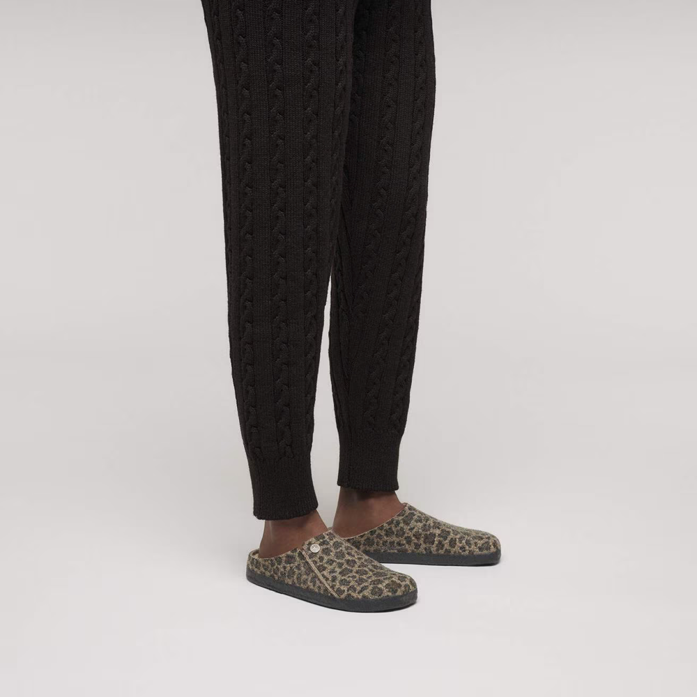 Model view of Birkenstock Zermatt Shearling Slip On Clog Slipper for women.