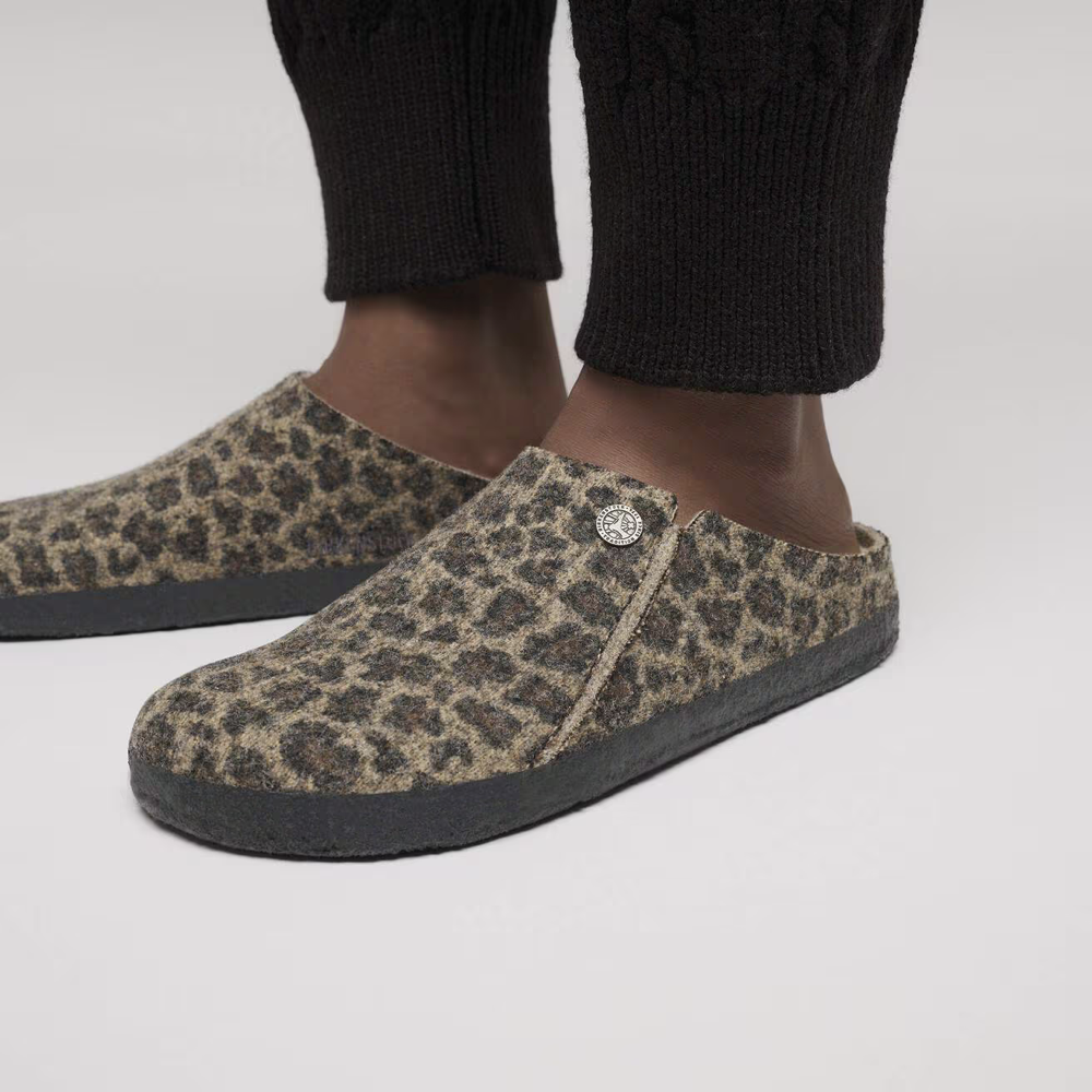 Model view of Birkenstock Zermatt Shearling Slip On Clog Slipper for women.
