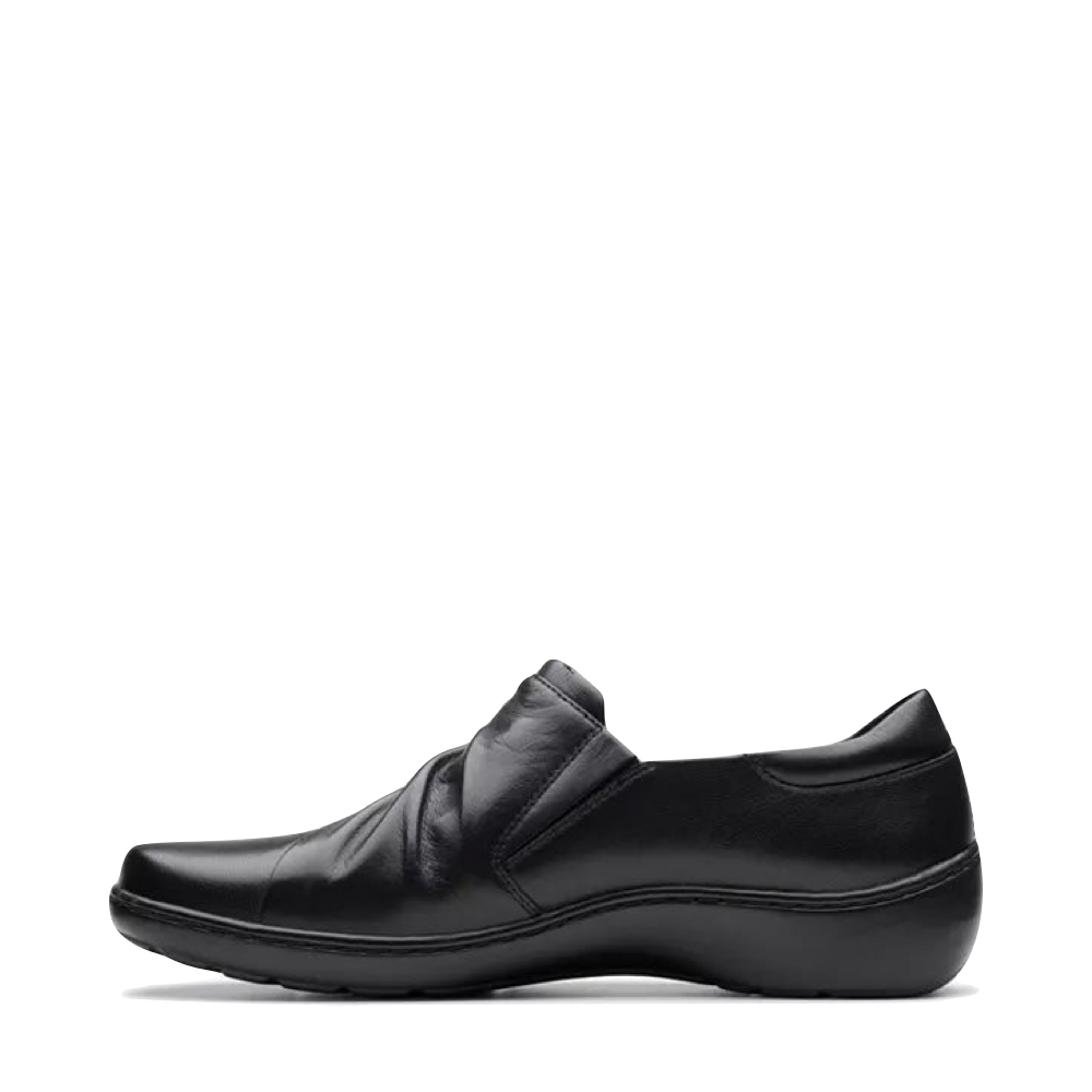 Side (left) view of Clarks Cora Aubrie Slip On Shoe for women.