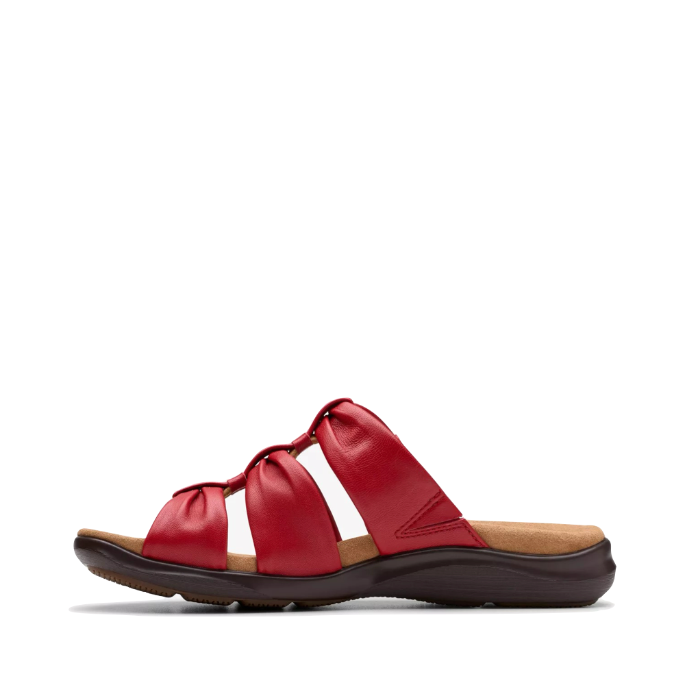 Side (left) view of Clarks Kitly Slide Sandal for women.