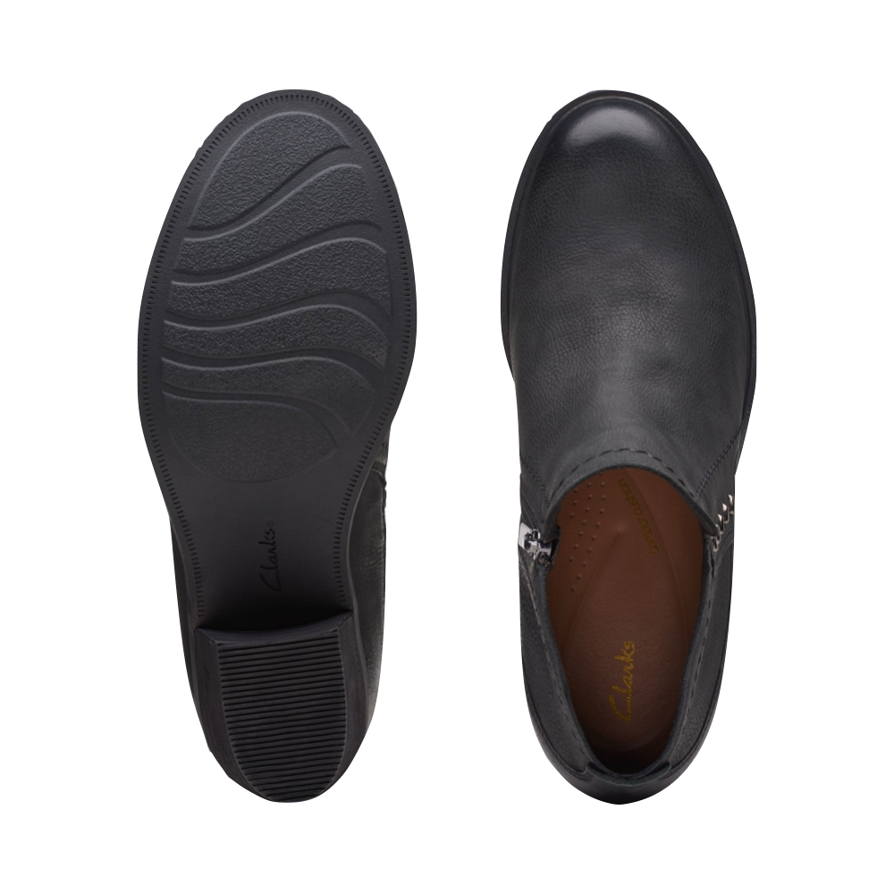 Top-down and bottom view of Clarks Neva Lo Side Zip Ankle Boot for women.
