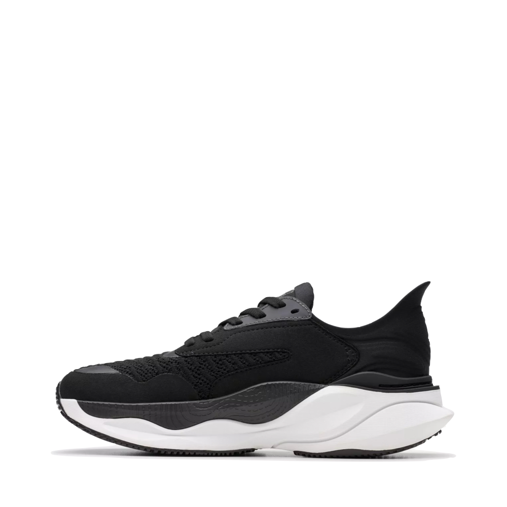 Side (left) view of Clarks Pace Sneaker for women.