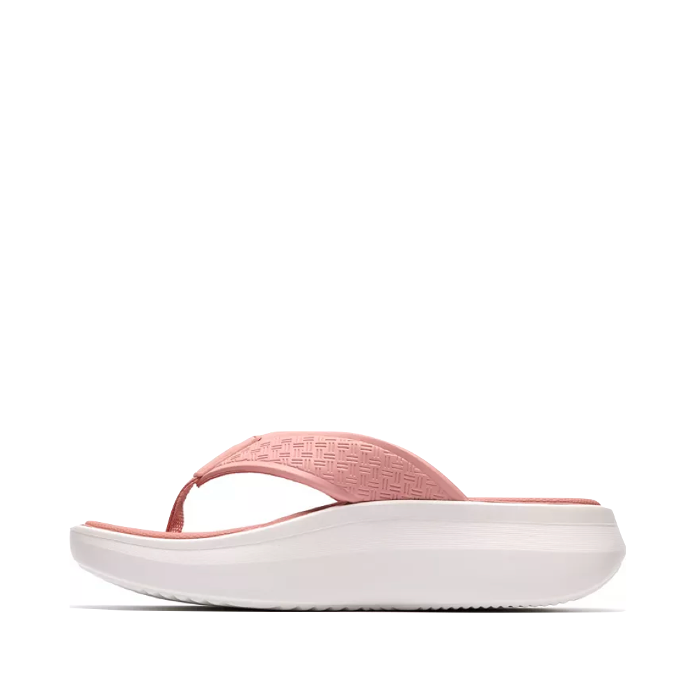 Side (left) view of Clarks Solevana Post Flip Sandal for women.