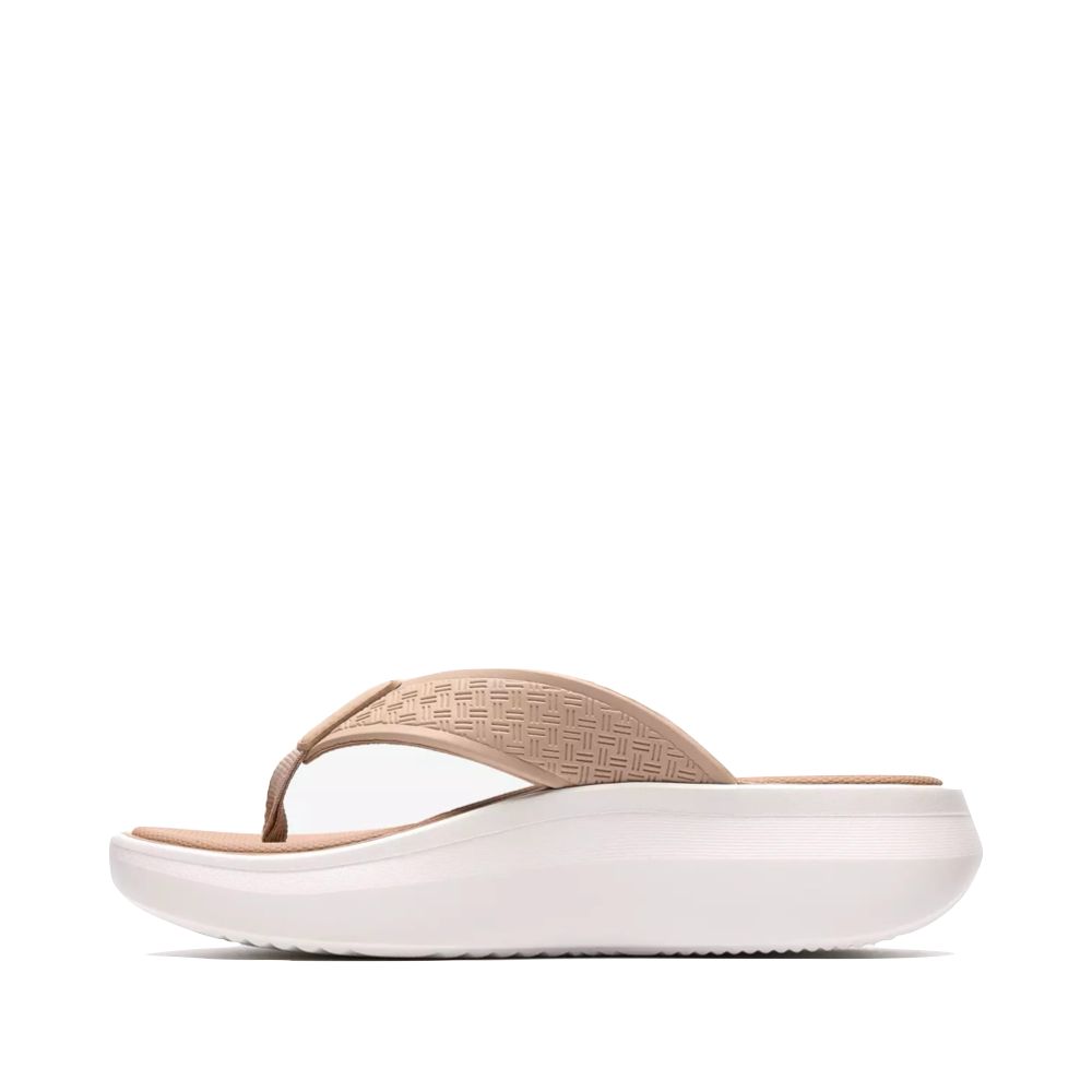 Side (left) view of Clarks Solevana Post Flip Sandal for women.