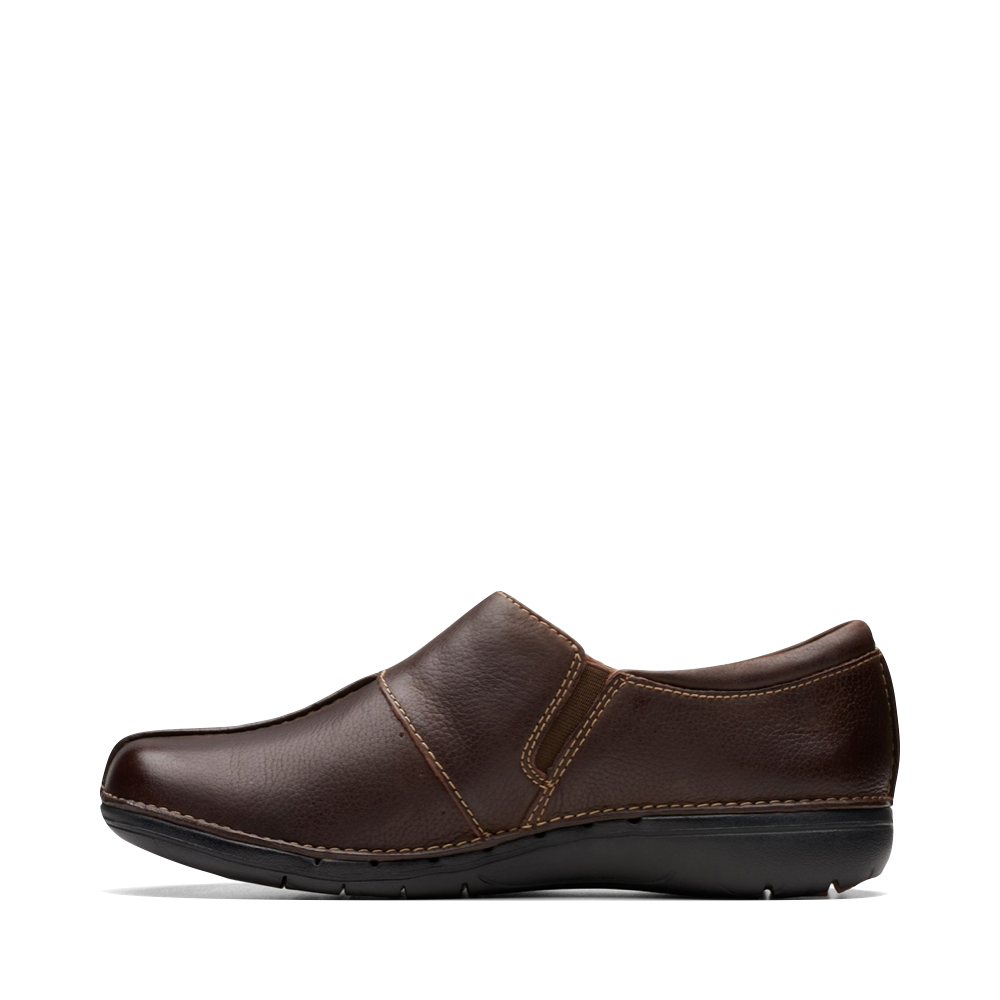 Side (left) view of Clarks Un Loop Ave Smooth Leather Slip On for women.